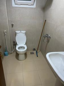 a bathroom with a toilet and a sink at Dorry Village in Dahab