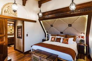 a bedroom with a large bed in a room at El Diria 302- 2 Bedroom Ocean View Condo in Tamarindo +27 photos