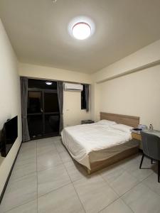 Llit o llits en una habitació de Royal Court B&B