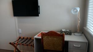 TV a/nebo společenská místnost v ubytování Magpie Cottage Homestay Bed & Breakfast