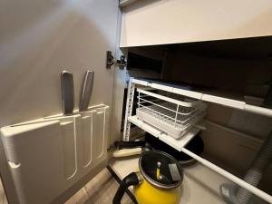 A cozinha ou cozinha compacta de 名古屋城に1番近い名古屋市北区若鶴民泊