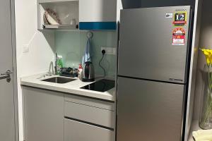 Køkken eller tekøkken på The Riv at Riveria City