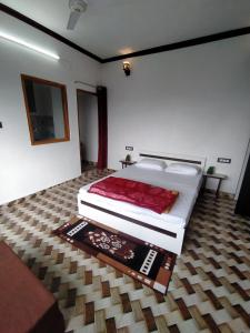 Postel nebo postele na pokoji v ubytování Dev Home Stay Almora + 8 fotografií