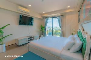 TV a/nebo společenská místnost v ubytování Anvaya Cove, Seabreeze Verandas 2BR