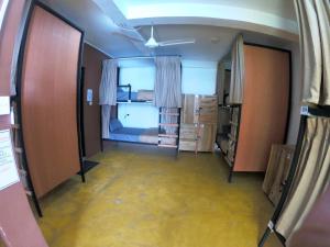 TV o dispositivi per l'intrattenimento presso Beyond Nomad Luxury Hostel