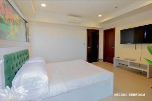 TV a/nebo společenská místnost v ubytování Anvaya Cove, Seabreeze Verandas 2BR