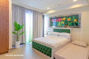 Postel nebo postele na pokoji v ubytování Anvaya Cove, Seabreeze Verandas 2BR + 26 fotografií