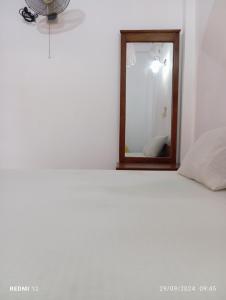 Postel nebo postele na pokoji v ubytování Pearl Deluna Resort Mirissa