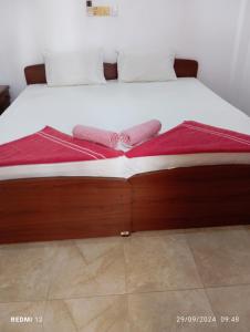 Postel nebo postele na pokoji v ubytování Pearl Deluna Resort Mirissa