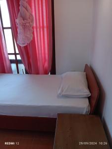 Postel nebo postele na pokoji v ubytování Pearl Deluna Resort Mirissa