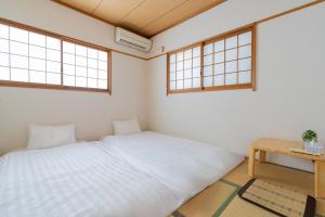 福屋 天下茶屋站房間的床