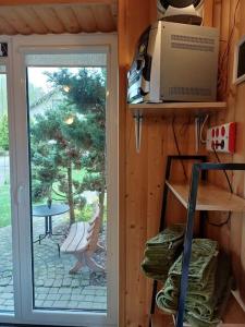 Fotografie z fotogalerie ubytování Cottage with fireplace and sauna v destinaci Pakalniškės