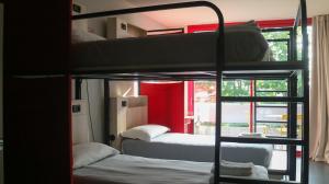 Letto o letti in una camera di Le Magnolie