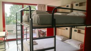 Letto o letti in una camera di Le Magnolie