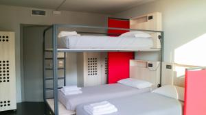 Letto o letti in una camera di Le Magnolie