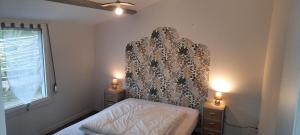 Ένα ή περισσότερα κρεβάτια σε δωμάτιο στο La mésange bleu