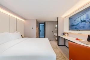 ONESS Executive Hotel Guangzhou Huangpu-Free Shuttle Bus from 15th October to 5th November客房内的一张或多张床位