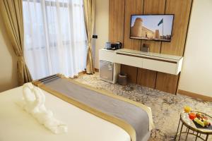 TV a/nebo společenská místnost v ubytování Ramadi Hotel + 20 fotografií