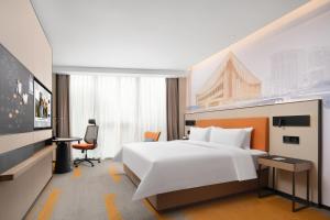 Postelja oz. postelje v sobi nastanitve Hampton by Hilton Xi'an Chanba