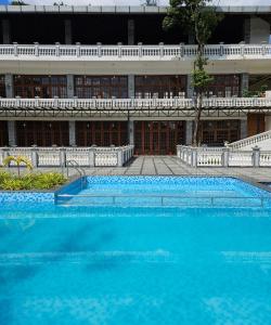 Bazén v ubytování Ayara Coorg Resort and Spa nebo v jeho okolí