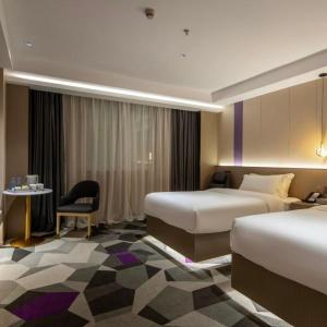 Shenzhen Jincheng Hotel客房内的一张或多张床位