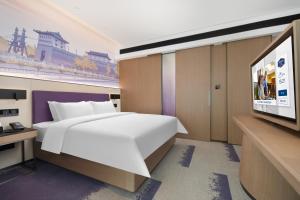 Postelja oz. postelje v sobi nastanitve Hampton by Hilton Xi'an Chanba
