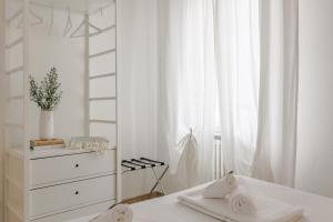 En eller flere senge i et værelse på Family 3