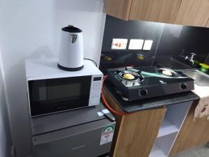 Kuchyň nebo kuchyňský kout v ubytování Tsavo Studio Fedha