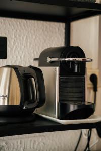 Příslušenství pro přípravu čaje a kávy v ubytování Nid Malouin Saint-Malo intramuros plage à 200m