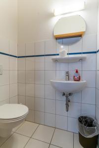 Koupelna v ubytování Haus Nordmeer + 37 fotografií