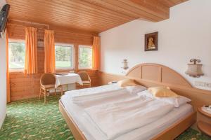 Posteľ alebo postele v izbe v ubytovaní Hotel Lichtenstern