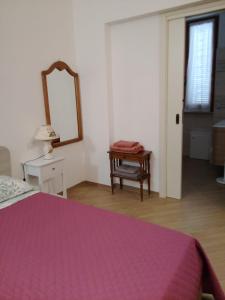 Postel nebo postele na pokoji v ubytování A Casa di Zia