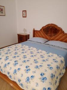 Postel nebo postele na pokoji v ubytování A Casa di Zia