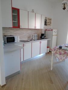 Kuchyň nebo kuchyňský kout v ubytování A Casa di Zia