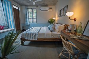 Katil atau katil-katil dalam bilik di Vana by Loka - Nature Inspired Studios