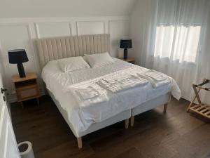 Postel nebo postele na pokoji v ubytování Peacefull Oasis in Helsingborg