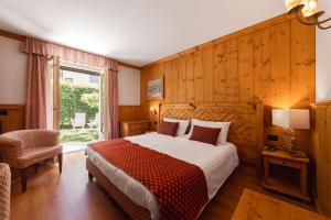 Postel nebo postele na pokoji v ubytování Hotel Bouton d'Or - Courmayeur