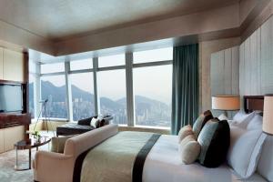 A bed or beds in a room at The Ritz-Carlton, Hong Kong