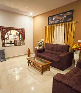 Posezení v ubytování HOME STAY at SRIRAM VILLA Kumbakonam