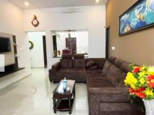 TV a/nebo společenská místnost v ubytování HOME STAY at SRIRAM VILLA Kumbakonam
