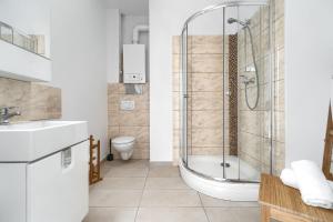 Koupelna v ubytování Aparthotel Platinum + 53 fotografií