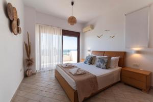 Postel nebo postele na pokoji v ubytování Villa Del Nonno + 37 fotografií