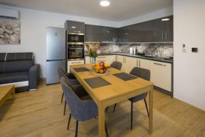 Kuchyň nebo kuchyňský kout v ubytování Apartmány U Betléma