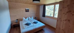 Postel nebo postele na pokoji v ubytování Vergalda Apartments