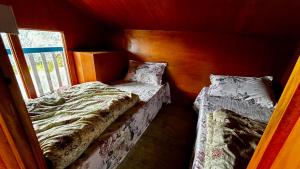 Postel nebo postele na pokoji v ubytování Lama Homestay