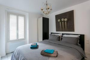 Postel nebo postele na pokoji v ubytování Relais Cocorico - Town House 4 Private Suites, AC Cinema Gym & Sauna + 25 fotografií