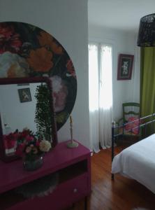 Postel nebo postele na pokoji v ubytování La maison verte + 7 fotografií