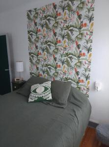 Postel nebo postele na pokoji v ubytování La maison verte