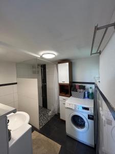 Kuchyň nebo kuchyňský kout v ubytování Ferienwohnung in Lochau + 9 fotografií