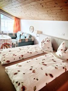 Postel nebo postele na pokoji v ubytování Café Rudi Living